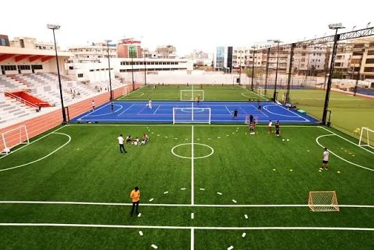 Sports ground with football and tennis courts
